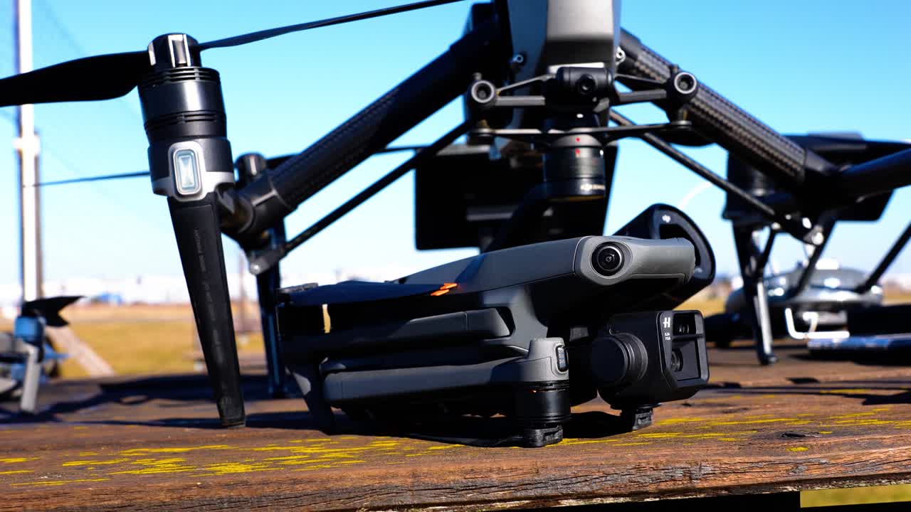 DJI Mavic 3 Drone with Camera on Wooden Surface