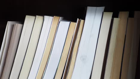 close up of a shelf with many books