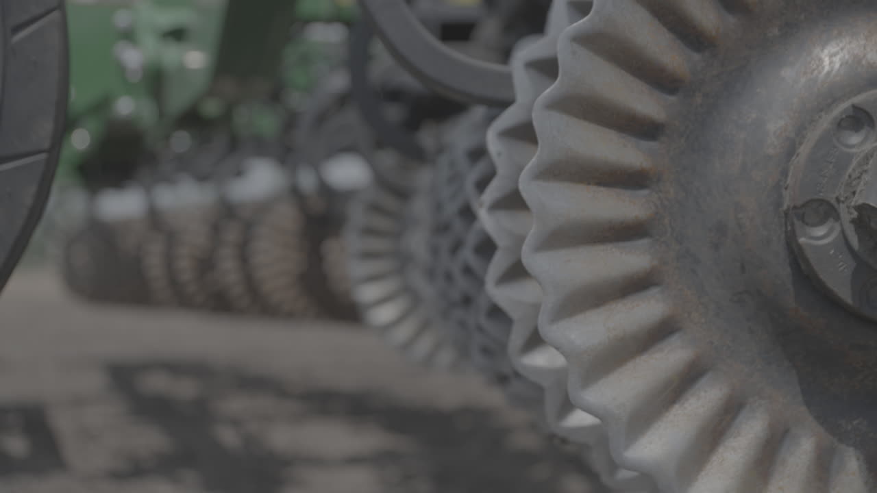 Details of a seed dispenser piece of farming equipment on a farm in Iowa