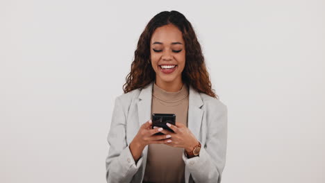 Business-woman,-cellphone-and-typing-in-studio