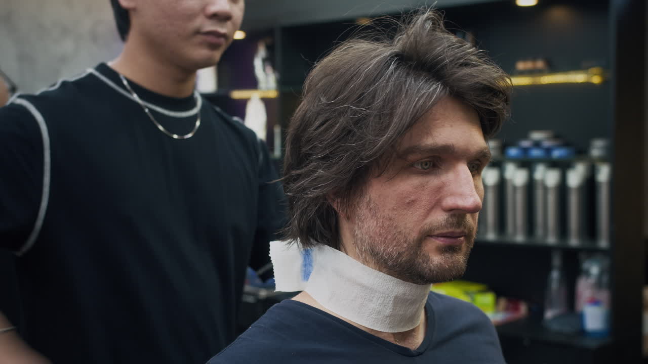 Man getting a haircut at a hair salon
