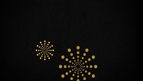 animation of orange fireworks exploding on black background