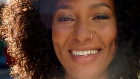 portrait of a african woman with a curly afro