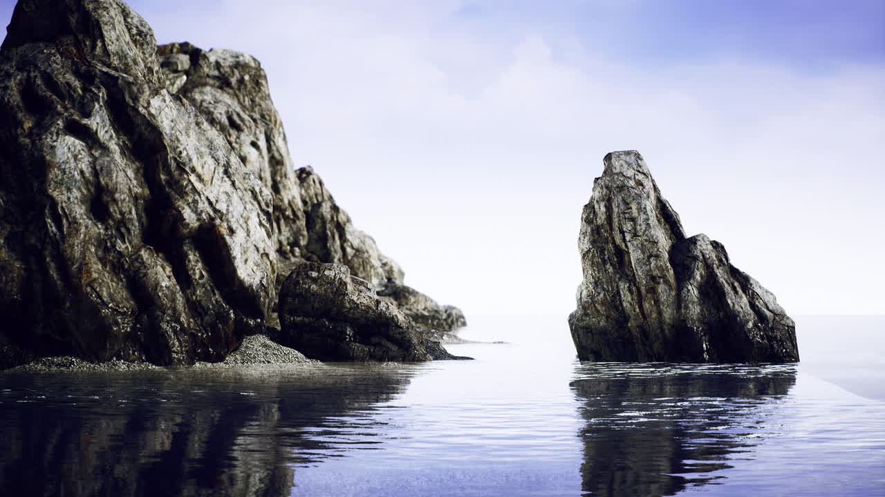 Majestic coastal rocks reflect under twilight sky at a serene beach