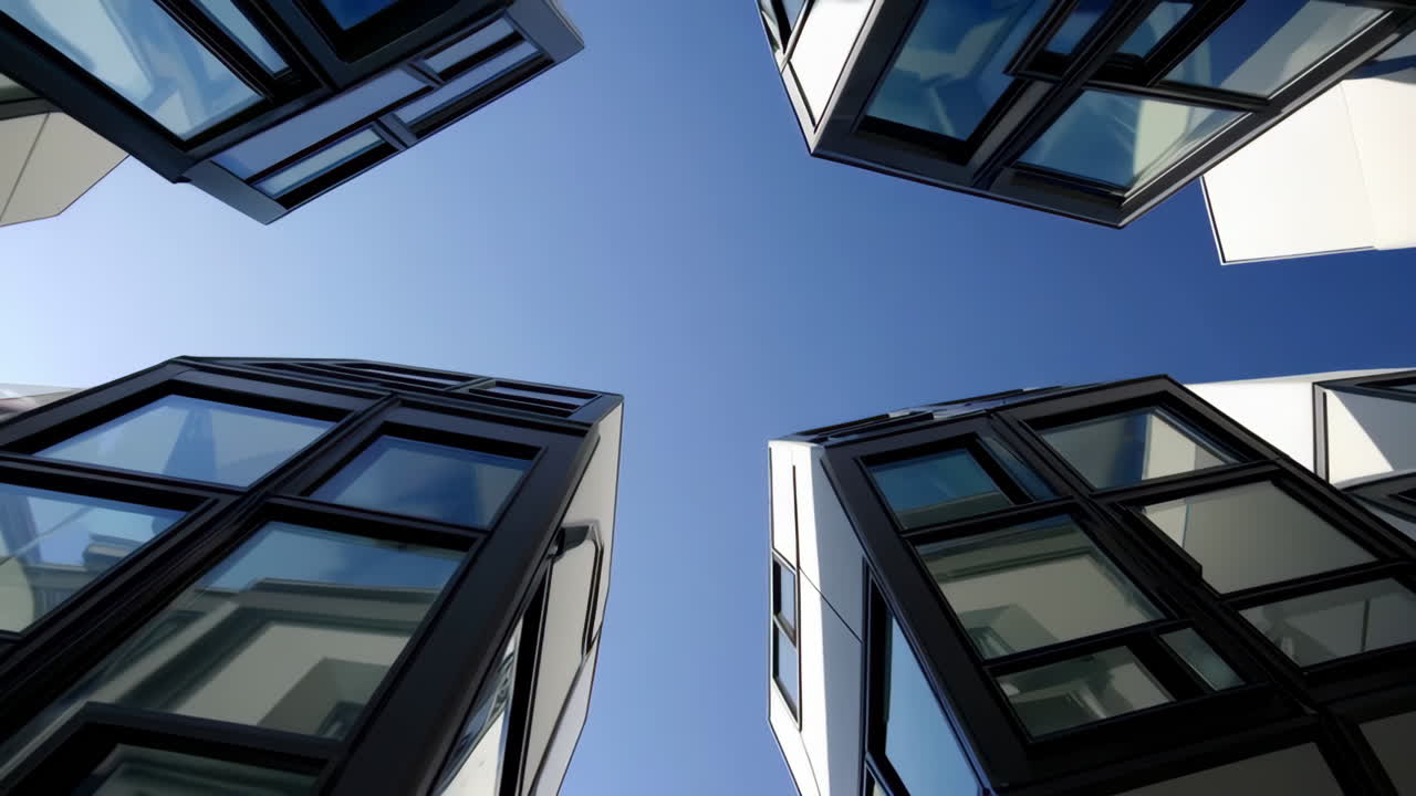 Modern Building Corners Against a Clear Blue Sky