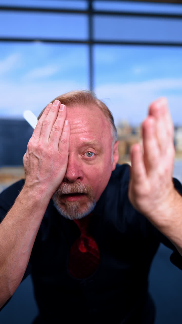 Mature funny man. Attractive office manager posing. Vertical video.