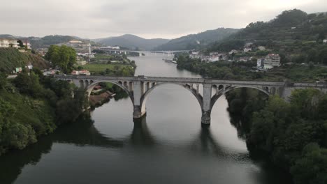 ponte de pedra bridge over douro river between entre os rios and castelo de paiva in portugal