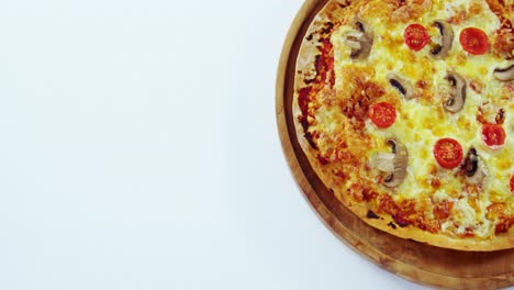 Baked-pizza-on-wooden-board