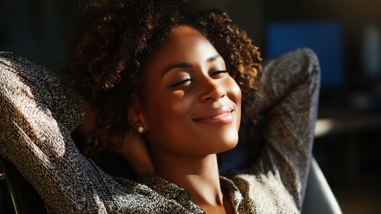 A person deeply immersed in a moment of relaxation, enjoying the peaceful ambiance in a cozy setting, reflecting a serene mood and a sense of tranquility, with sunlight gently illuminating their content expression