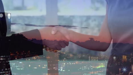 animation of businessman handshake over cityscape