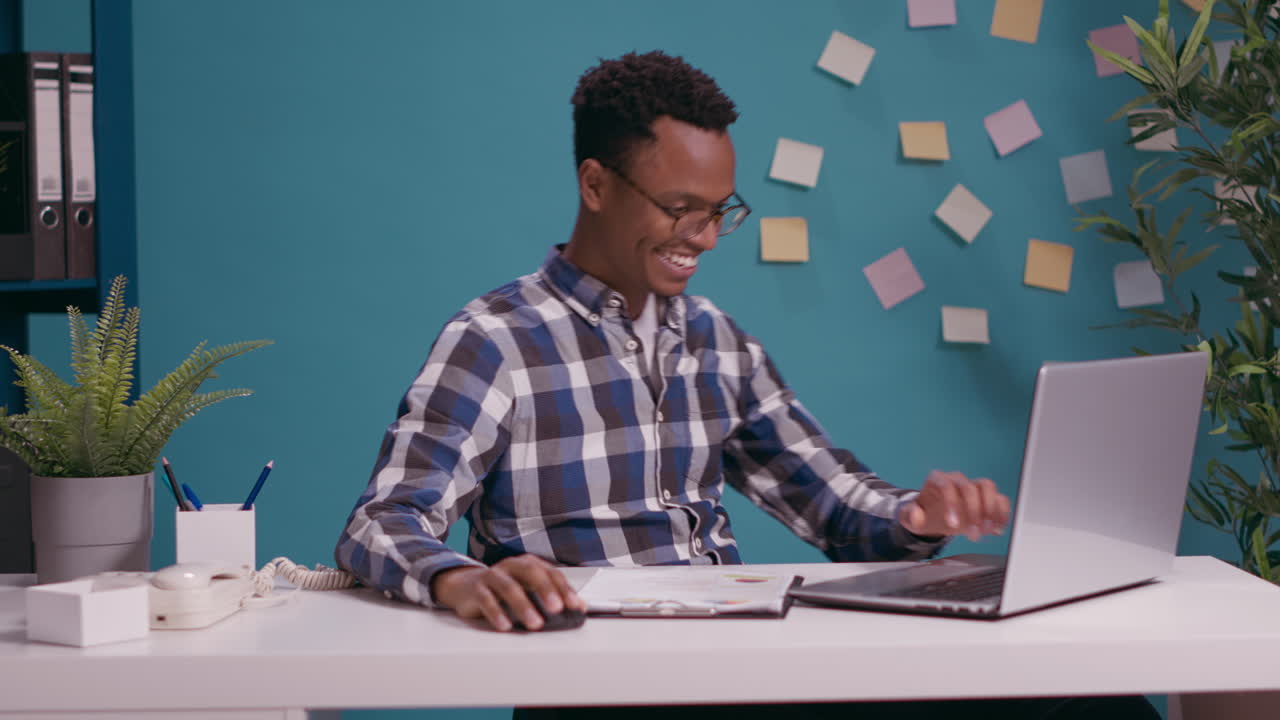 Cheerful person celebrating business success and accomplishment