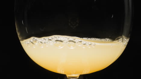 sweet cocktail with grapefruit juice and alcohol with bubbles