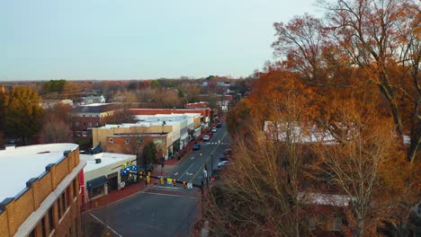 drone rise over the town of davidson in the winter