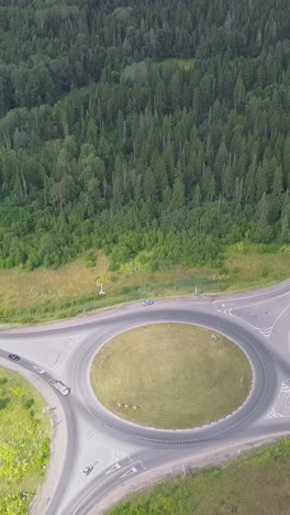 aerial view of roundabouts and forests