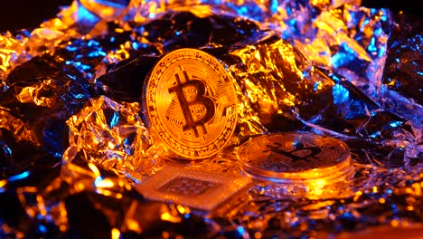 Bitcoin and Processor on Foil with Colorful Lighting