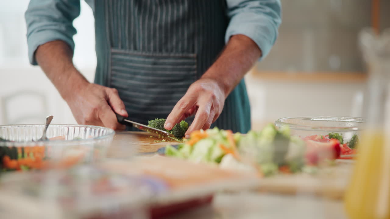 Preparing fresh salad with vegetables