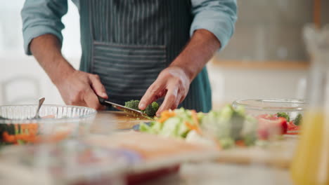 preparing fresh salad with vegetables