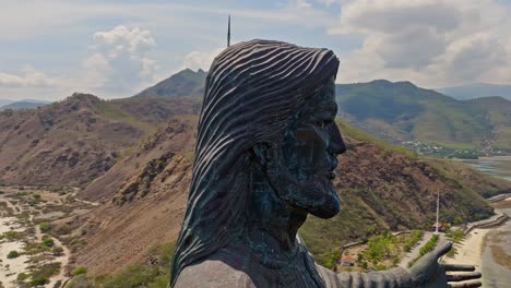 Cape-Fatucama,-Dili,-East-Timor---Upper-Part-of-Cristo-Rei-of-Dili-Statue---Orbit-Drone-Shot