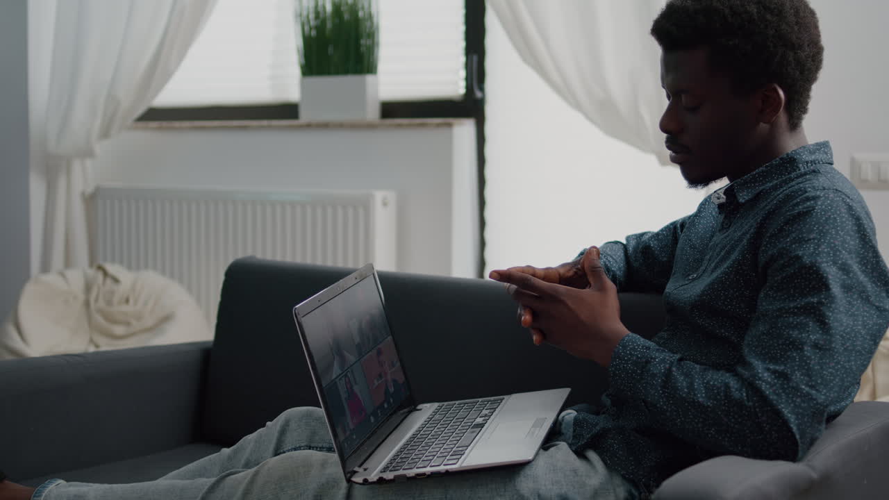 African american ethnicity man using online conference webcam communication to connect via internet