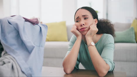 sad, thinking and a woman in her home for laundry