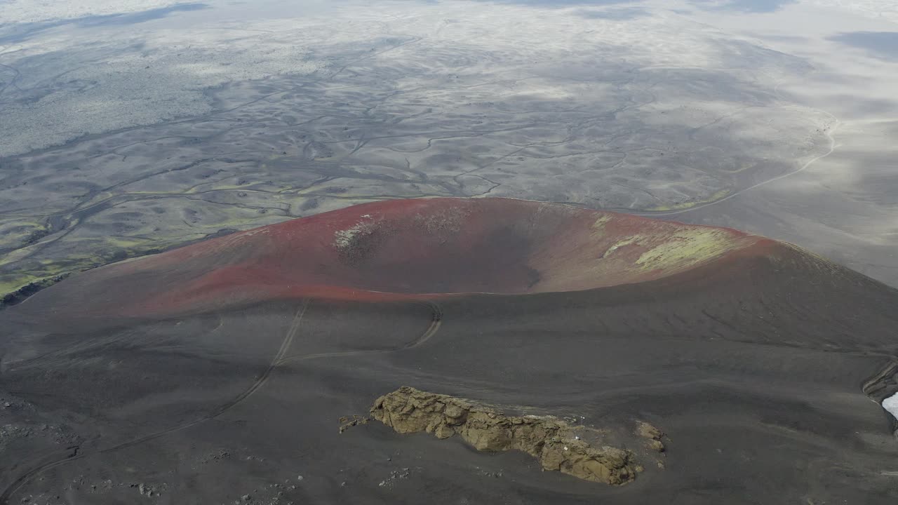 Aerial view of tremendous Raudaskal Apple Crater on iceland Island during sunny day - Spectacular volcanic landscape
