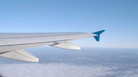 airplane wing in flight with place for text