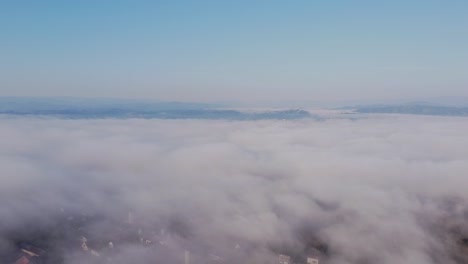 over the clouds magical fog cinematic droneshot