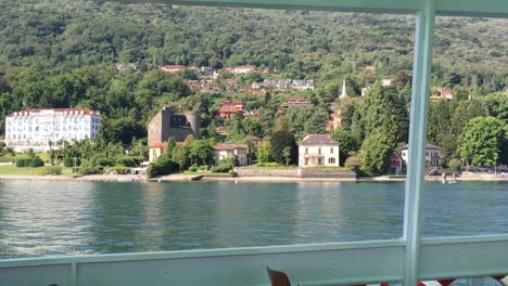 Sailing-on-a-boat-on-Lake-Maggiore,-Stresa,-Italy,-on-a-quiet-summer-day