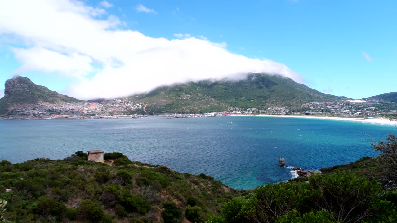 Pan shot over Hout Bay from The Sentinel toward beach from Chapman's Peak