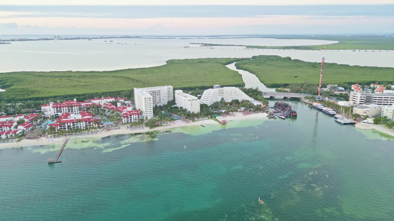 Cancun's playa langosta beach, resorts, nichupte lagoon, and pier, aerial view