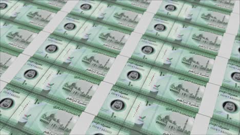 10-Billetes-De-Dirham-De-Los-Emiratos-Árabes-Unidos-Impresos-Por-Una-Prensa-Monetaria