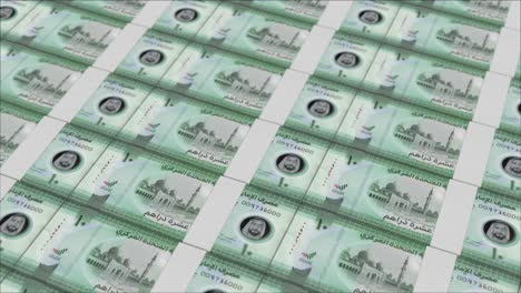 10 united arab emirates dirham banknotes printed by a money press