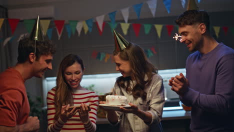 colleague photographing birthday party in festive decorated room close up.