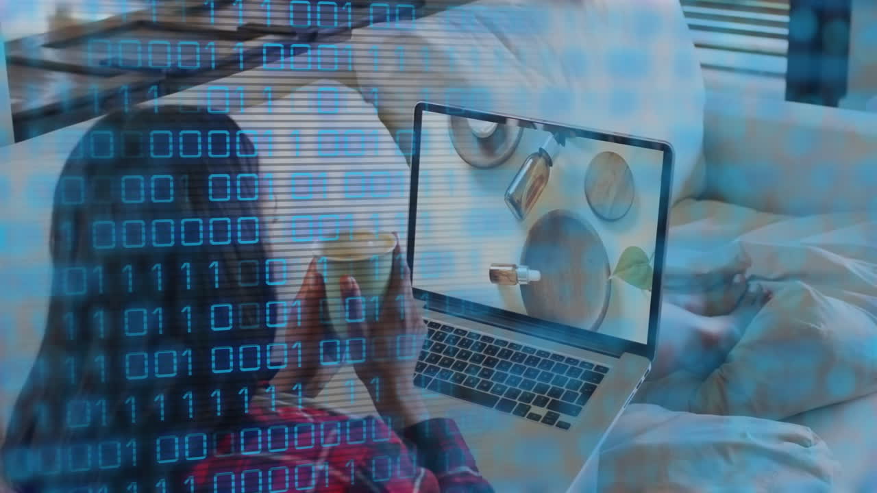 Binary code animation over person watching cooking video on laptop