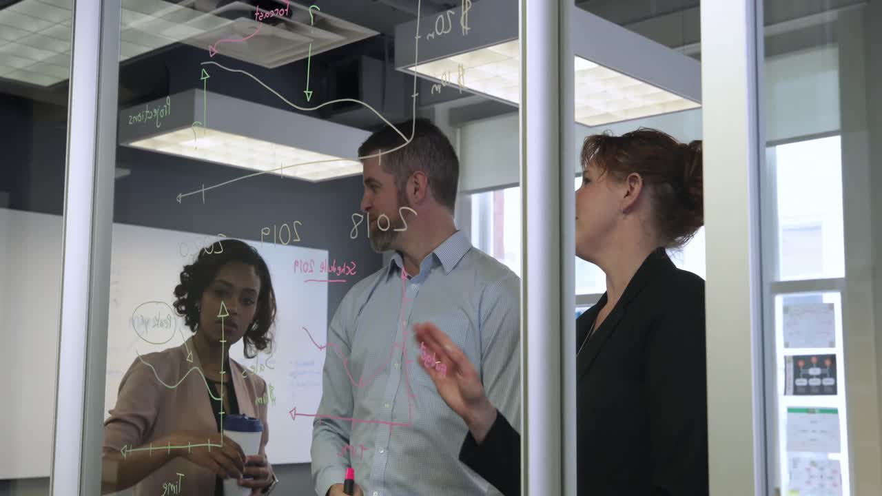 Business professionals working in a modern office&acirc;&euro;&uml;