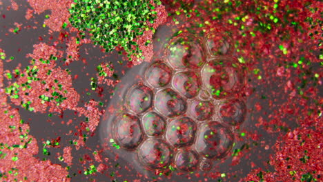 red and green glitter bubbles