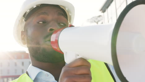 megaphone in hand of a construction worker