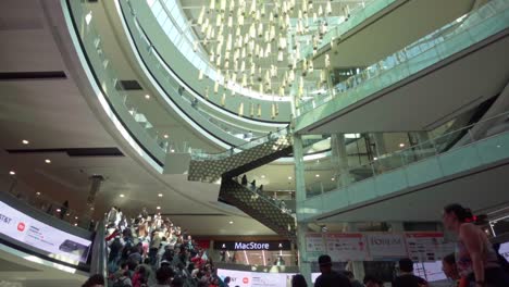 crowded modern shopping mall interior