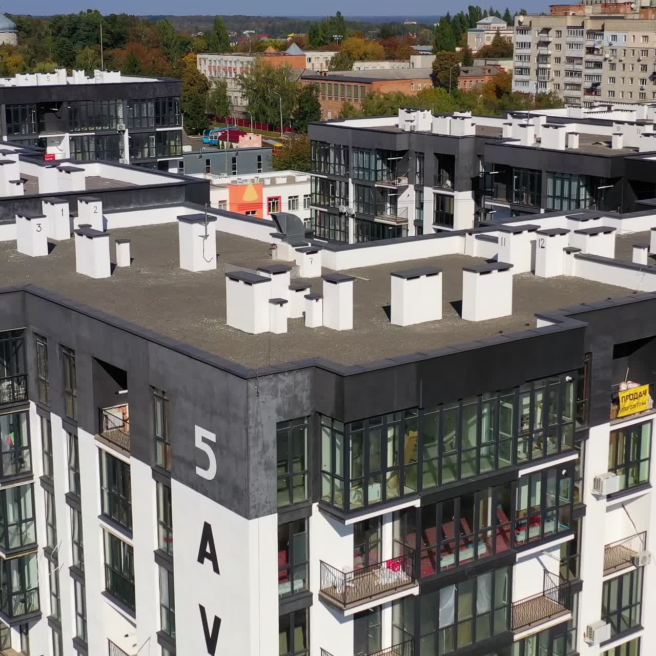 Black and white residential buildings. Aerial view of buildings in residential area of the city
