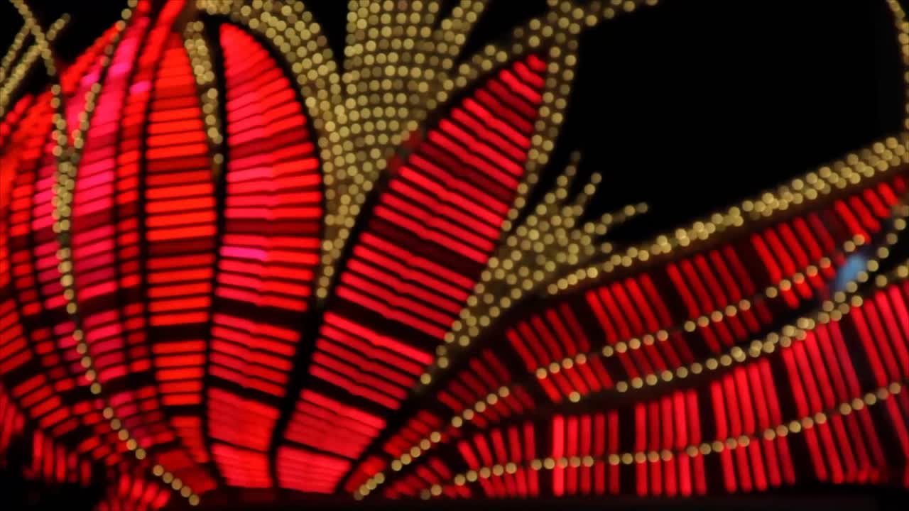 Motif abstrait dynamique de lumières rouges et jaunes lumineuses