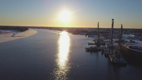 winter river port sunset