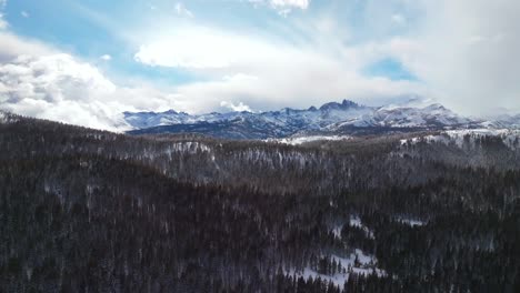 mammoth mountain ski resort california the hemlocks ritter range sierra nevadas main lodge minarets summit vista view winter spring sunny blue sky snowy misty fog jagged peaks gray clouds circle right