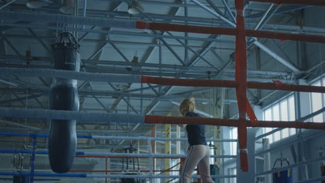 woman training in boxing ring