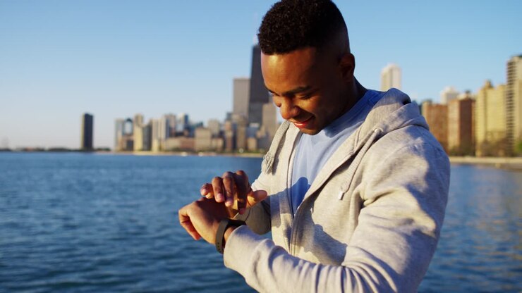 African American male wearing heart and weightloss monitor