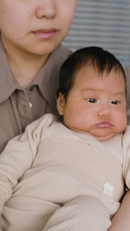Baby in mother's arms