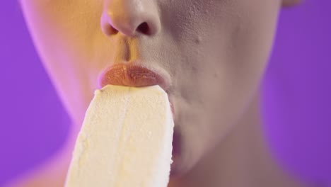 woman eating ice cream seductively, close up mouth portrait