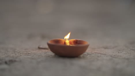 close-up of flame dancing on an old-style oil lamp.