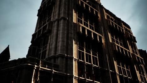 a tall stone building with many windows