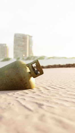 rusty gas tank on the beach