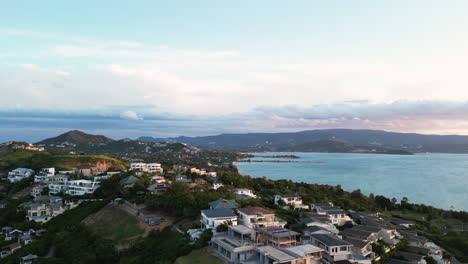 Aerial-View-of-Luxurious-Mansions-on-Northern-Koh-Samui-Hills-Overlooking-Ocean